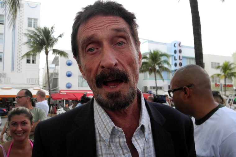 Software company founder John McAfee speaks in Miami Beach on Dec. 13, a day after being deported to US from Guatemala.