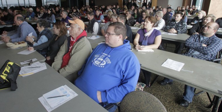 Carl Stubbs, center, principal from Valley View Elementary School, in Pleasant Grove looks on with other teachers during concealed-weapons training for the teachers on Thursday.