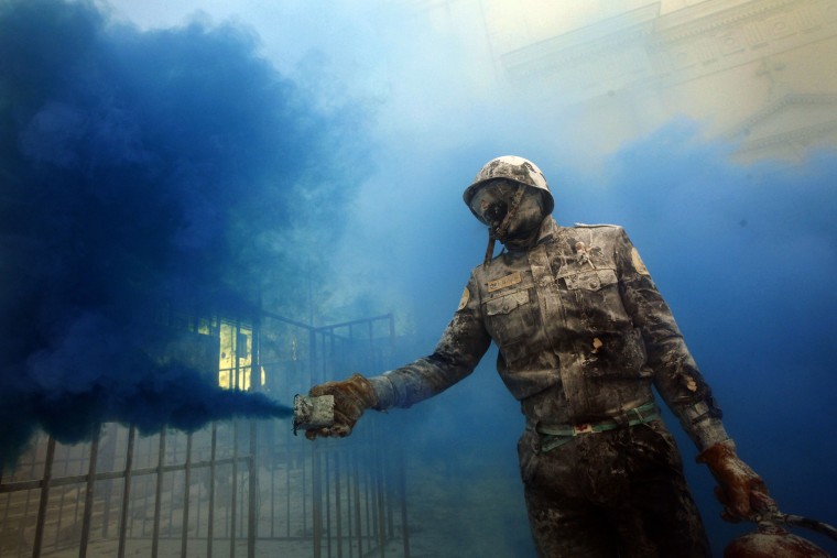 A reveler takes part in festival of Els Enfarinats, in the town of Ibi near Alicante, Spain, on Dec. 28.
