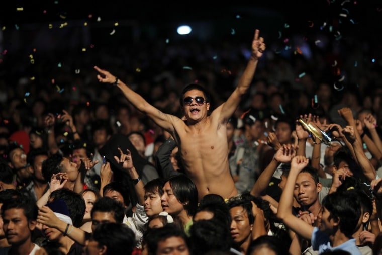 People celebrate at Myanmar's first public New Year countdown celebration at the Myoma grounds in Yangon January 1, 2013.