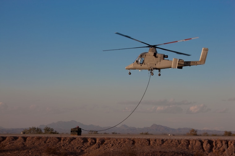 The robotic K-Max helicopter shown here in a file photo is flying re-supply missions in Afghanistan, opening up the era of unmanned logistics.