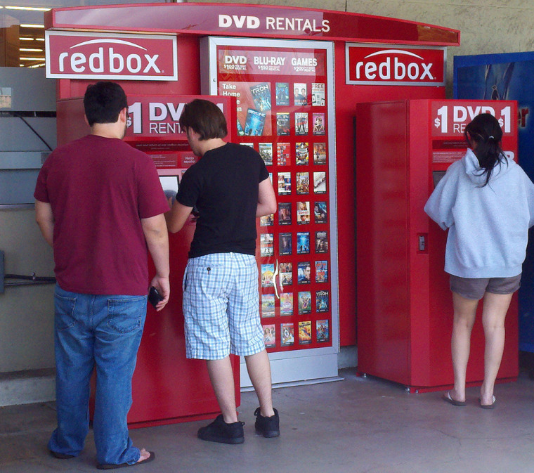 Customers rent DVD movies from a redbox video kiosk in Burbank, California, May 8, 2011. Picture taken May 8, 2011. REUTERS/Fred Prouser (UNITED STATES - Tags: SOCIETY BUSINESS)