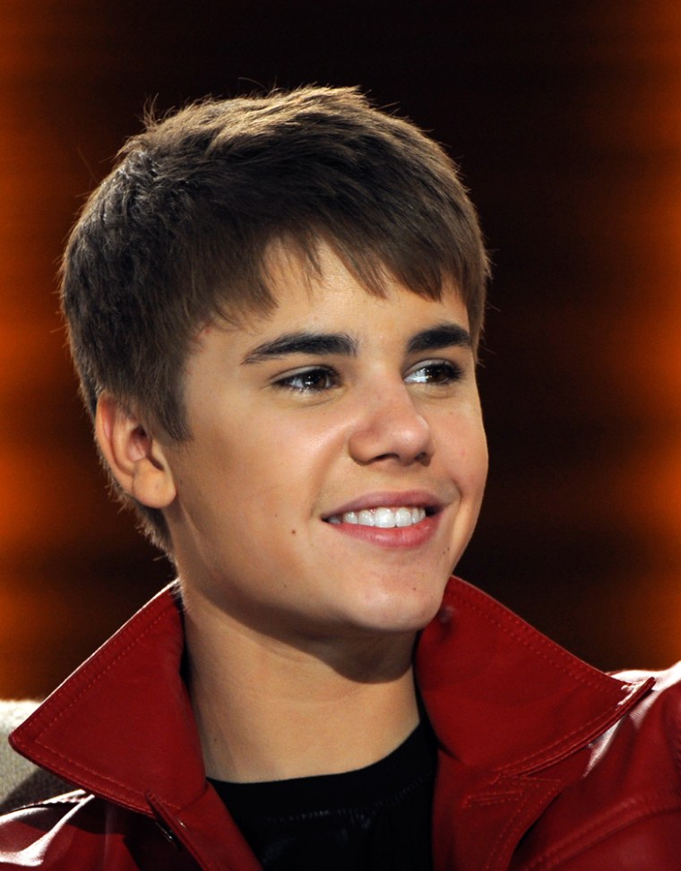 In this Saturday, March 19, 2011 photo, Canadian singer Justin Bieber smiles during the German TV show \"Wetten Dass...?\" (Bet it...?) in Augsburg, southern Germany. (AP Photo, Christof Stache, Pool)