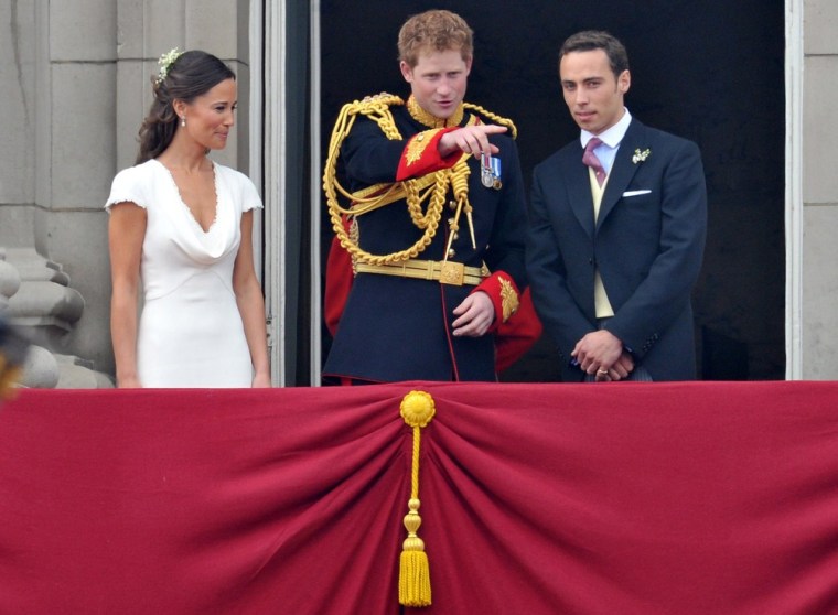 epa02708554 Britain's Prince Harry (C) and the bride's sister Pippa Middleton and brother James Middleton on the balcony of Buckingham Palace in London, Britain, 29 April 2011, after the wedding ceremony of Prince William and Kate Middleton at Westminster Abbey.  EPA/PETER KNEFFEL