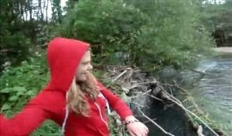 Web video: Woman throws puppies in river, 4chan tracks her down