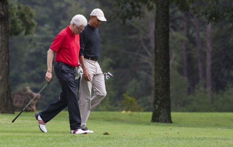 President Barack Obama, right, talks with former President Bill Clinton while playing a game of golf at Andrews Air Force Base on Saturday, Sept. 24, 2011, in Andrews Air Force Base, Md. (AP Photo/Evan Vucci)