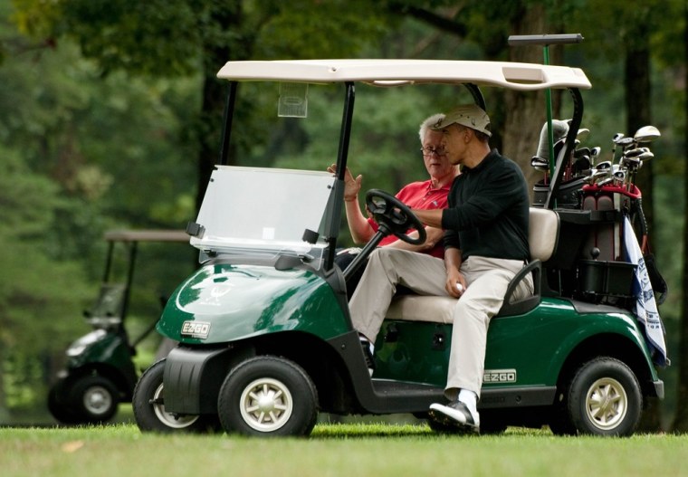 US President Barack Obama and former President Bill Clinton ride in a golf cart after completing the first hole at the Andrews Air Force Base golf course on September 24, 2011. AFP PHOTO/Nicholas KAMM (Photo credit should read NICHOLAS KAMM/AFP/Getty Images)