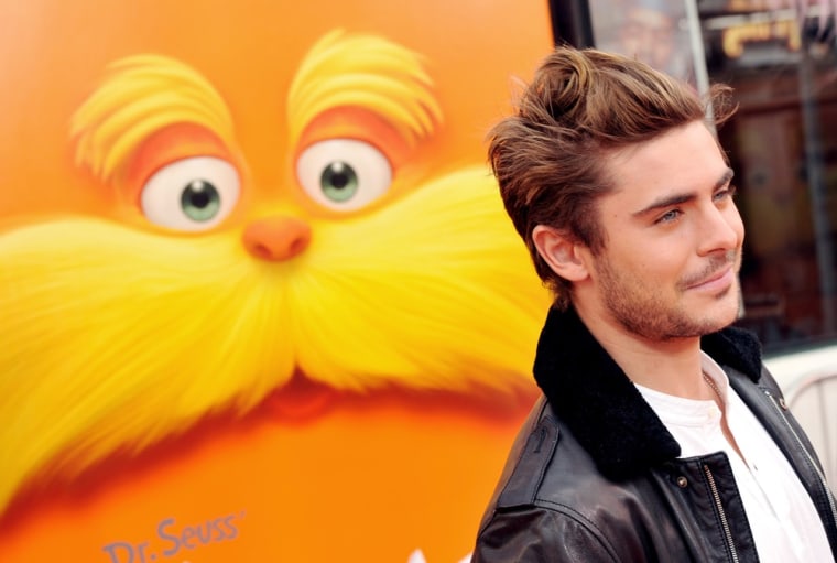UNIVERSAL CITY, CA - FEBRUARY 19:  Actor Zac Efron arrives at the premiere of Universal Pictures and Illumination Entertainment's 3D-CG \"Dr. Seuss' The Lorax\" at Citywalk on February 19, 2012 in Universal City, California.  (Photo by Kevin Winter/Getty Images)