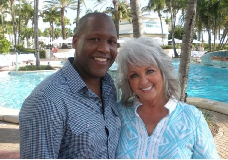 TODAY producer Max Paul poses with Paula Deen at the South Beach Wine & Food Festival in Miami.