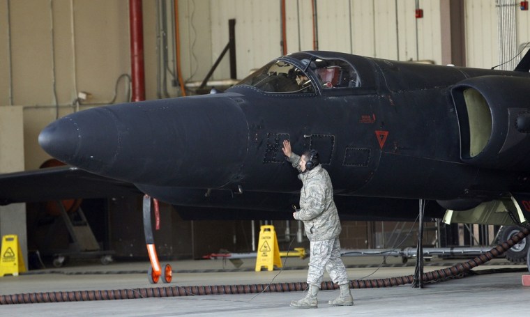 In this photo taken Feb. 16, 2012, a U.S. soldier checks a U.S. Air Force U-2 spy plane before takeoff during a training flight at the U.S. airbase in Osan, south of Seoul, South Korea. For more than 35 years, the Cold War era aircraft has been one of Washington's only reliable windows into military movements inside North Korea. As the world watches for signs of instability during North Korea's transition to a new leadership, the U-2 operations are as important _ or more so _ than ever. (AP Photo/Lee Jin-man)