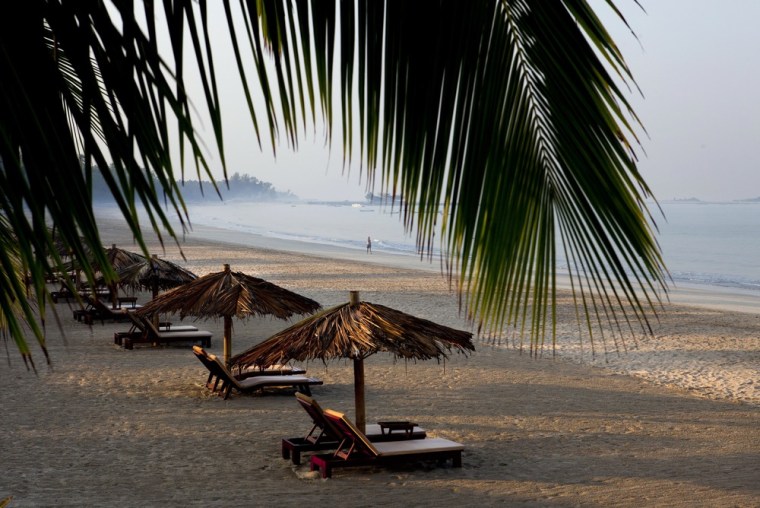 NGAPALI BEACH, MYANMAR - FEBRUARY 15: Beach chairs are seen early morning on an empty sandy beach February 15, 2012 on Ngapali beach, Myanmar. Tourism in Burma (Myanmar) is a slowly developing sector with the government opening up its doors to the rest of the world. Burma possesses great tourist potential, Ngapali beach along the Andaman Sea is considered the top beach resort still much of the industry remains to be developed.(Photo by Paula Bronstein/Getty Images)