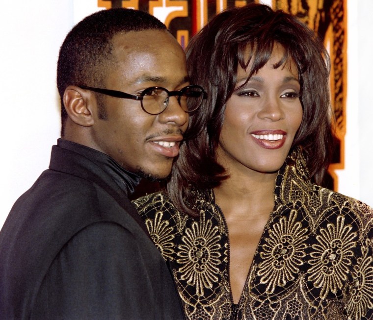(FILES) A file picture taken on February 8, 1994 in Los Angeles shows US singer Whitney Houston (R) posing with her husband, Bobby Brown, after winning seven awards at the 21st annual American awards ceremony. Grammy-winning pop legend and actress Whitney Houston, 48, was found dead on February 11, 2012 in a Beverly Hills hotel, police said. AFP PHOTO VINCE BUCCI (Photo credit should read VINCE BUCCI/AFP/Getty Images)