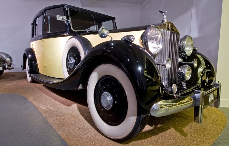 Driven by the villain in 1964's \"Goldfinger,\" this 1937 Rolls-Royce Phantom III is the oldest vehicle on display at the exhibit.