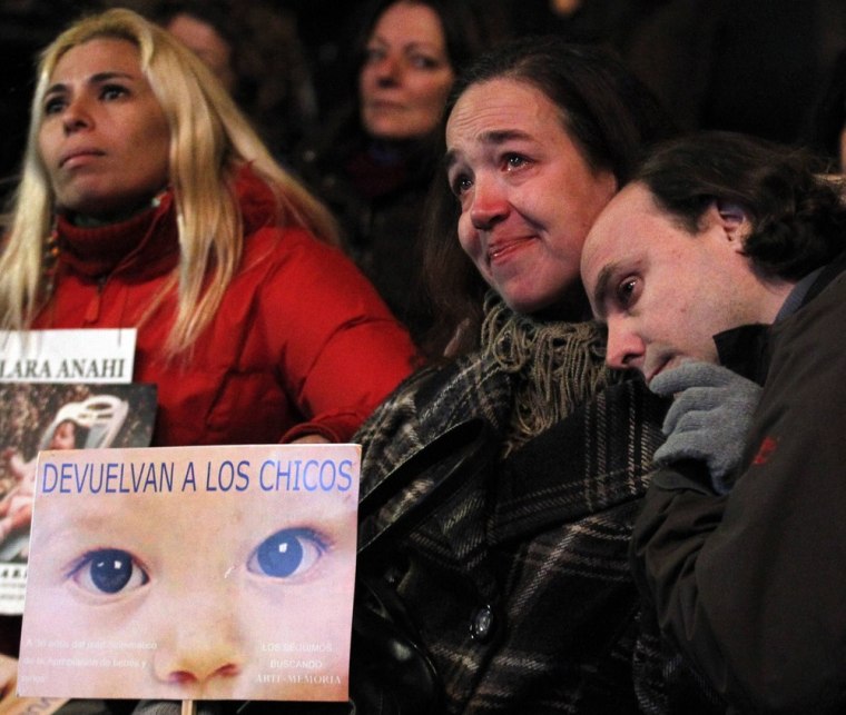 Members of human rights groups and other organisation react after hearing the verdict in the trial of former Argentine dictator Jorge Videla and other military officers in Buenos Aires on Thursday.