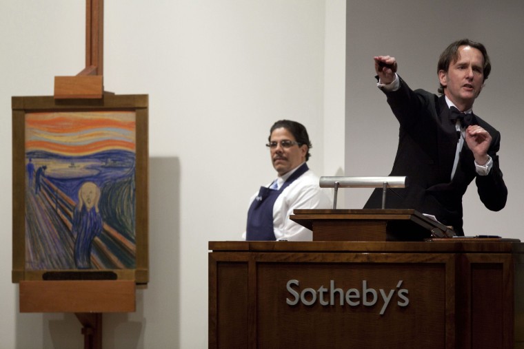 An auctioneer takes bids for Edvard Munch's \"The Scream\" in New York in May 2012. \"The Scream's\" mystery buyer has been revealed Leon Black, an American financier.