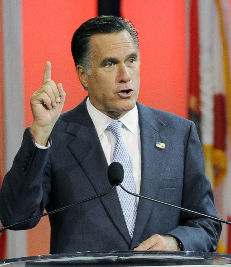 Republican presidential candidate,former Massachusetts Gov. Mitt Romney gestures during a speech to the NAACP annual convention, Wednesday, July 11, 2012, in Houston.