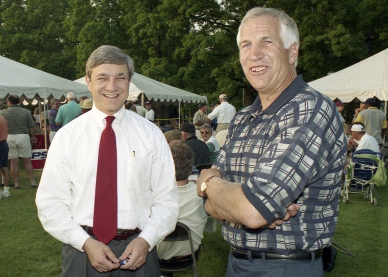 Penn State University President Graham Spanier, left, and Jerry Sandusky attend the Second Mile Celebrity Golf Classic, in State College, Penn. in 1997.