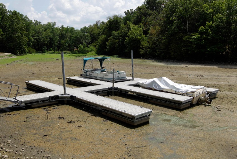 Boats sit on the bottom in a dry cove at Morse Reservoir in Noblesville, Ind., on July 16. The reservoir is down nearly 6 feet from normal levels and being lowered 1 foot every five days to provide water for Indianapolis.
