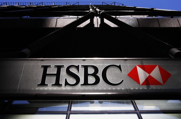 A HSBC bank logo is highlighted by the sun in London in this file photo taken March 1, 2010.