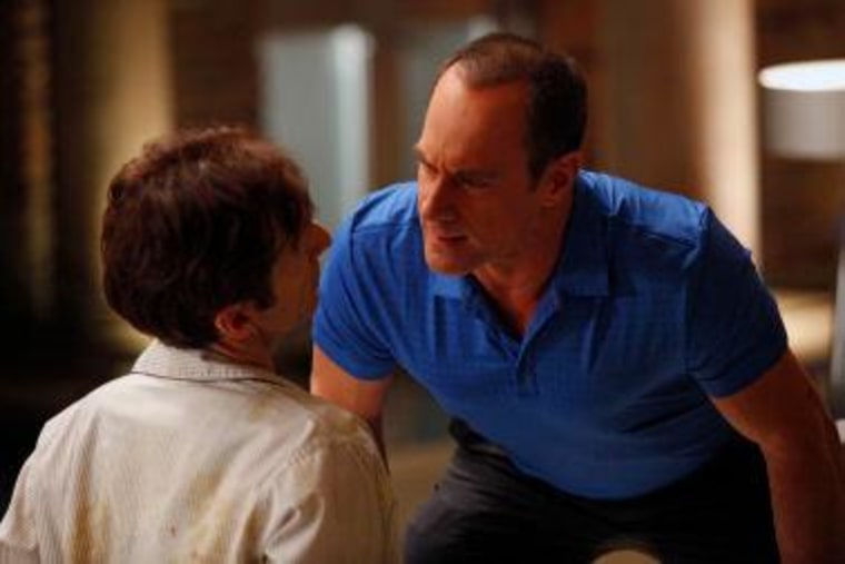 Roman (Christopher Meloni, right) thought he had the upper hand over villain Russell Edgington (Dennis O'Hare) just moments before he found himself under the pointy end of his own stake.