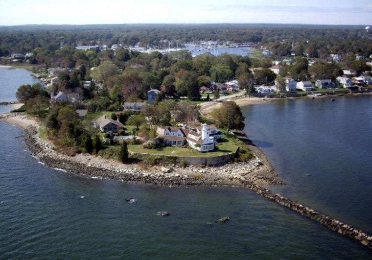 The Poplar Point lighthouse sits on a private peninsula in Wickford Harbor.
