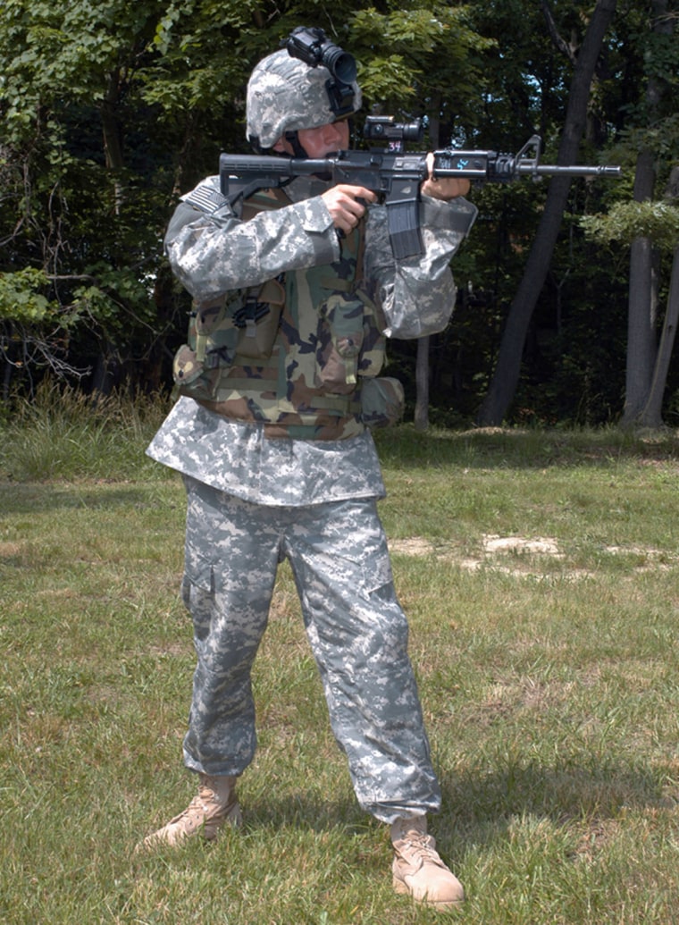 The Army unveiled a redesigned combat uniform with a digital camouflage pattern on June 14, 2004.