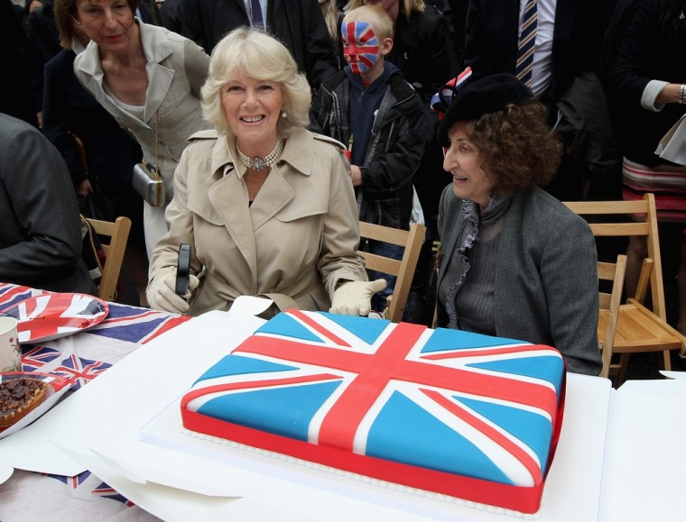 \"Oooh, yummers! Is there a doggie bag for Prince Charles, luv?\" Camilla attends the Big Jubilee Lunch in Piccadilly ahead of the Diamond Jubilee River Pageant on June 3 in London, England.