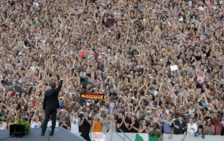 Democratic presidential candidate Sen. Barack Obama, D-Ill., waves as he arrives at the Victory Column in Berlin July 24, 2008.