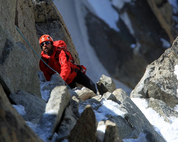 A climber makes his way up a part of the Mont Blanc mountain near Chamonix ski resort, in France, on July 17. Mont Blanc is the highest mountain in Europe and was the location of last week's tragic avalanche.
