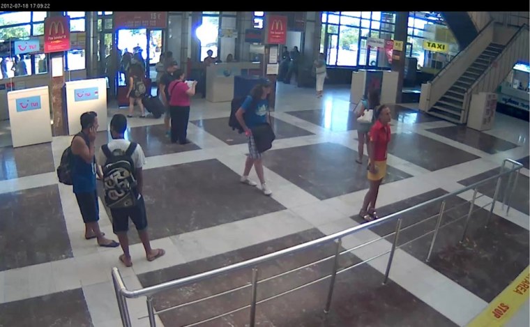 A still picture taken from a surveillance camera shows the suspected bomber (center) at Bulgaria's Burgas airport on Wednesday.