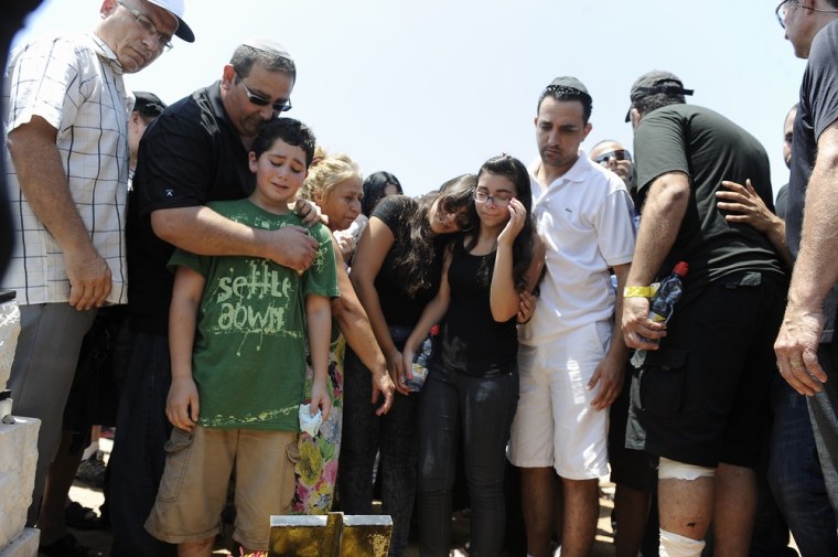 Relatives and friends attend the funeral of Kochava Shriki, who was killed when a suicide bomber targeted Israeli tourists in Bulgaria this week, at a cemetery in the city of Rishon Letzion, Israel, on July 20, 2012.