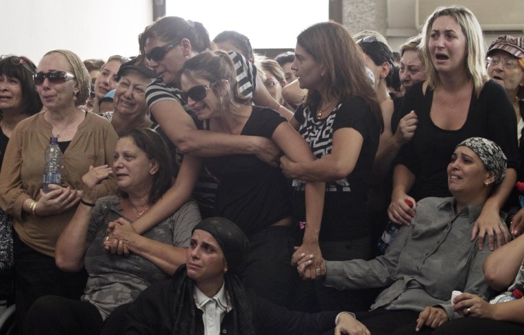Family and friends attend the funeral of Itzik Kolengi, 28, who was killed and his wife injured in the bombing in Bulgaria, in Petah Tikva, Israel, on July 20, 2012.