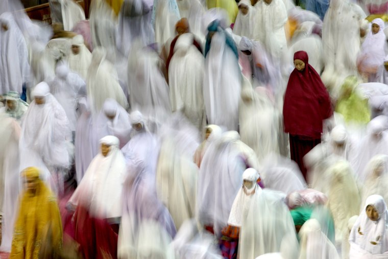 Muslim women perform an evening prayer, called tarawih, marking the eve of Ramadan at the Istiqlal Mosque in Jakarta, Indonesia on July 20, 2012.