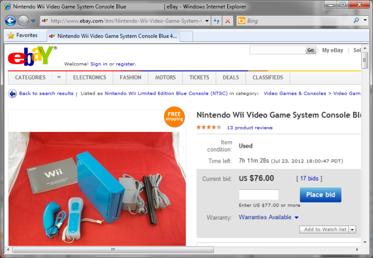 A screenshot shows a Nintendo Wii for sale on a red background. Researchers have found that red backgrounds lead to more aggressive bidding on eBay.