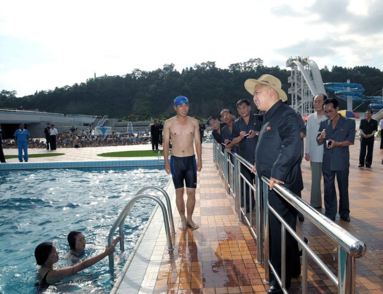 Kim Jong Un inspects a swimming pool as he attends the completion ceremony of the Rungna People's Pleasure Ground on July 25, 2012.