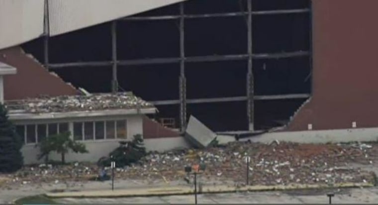 Part of this hangar wall at O'Hare International Airport in Chicago crumbled overnight just as a storm blew through.