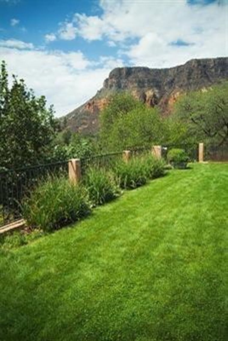 The sod roof has a hot tub, bed and views of the canyon.