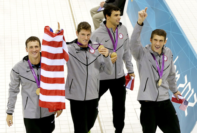 Celebrations as US men's team wins gold medal in Olympic 200-meter ...