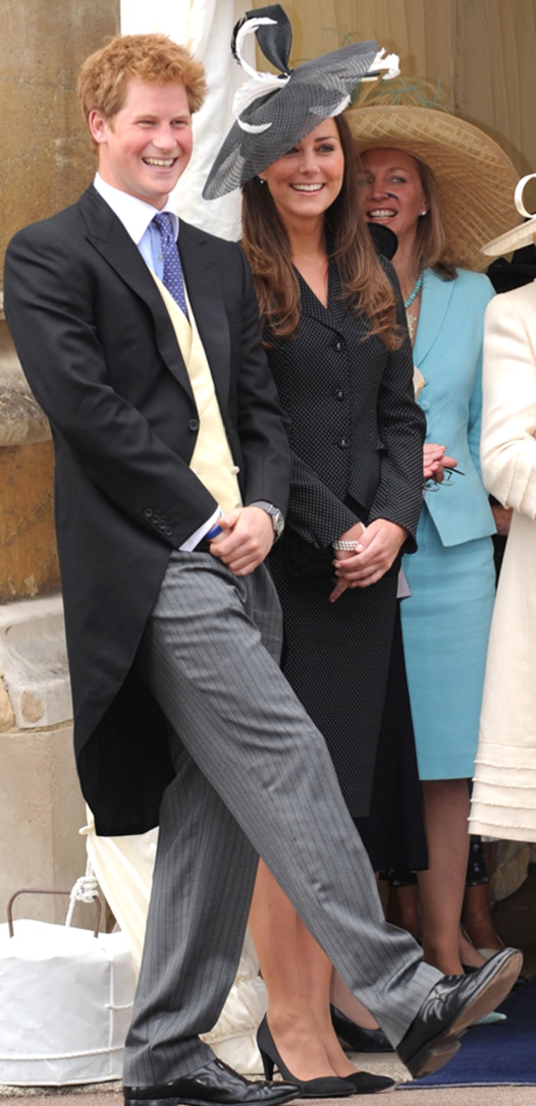 Kate Middleton is seen wearing a Philip Somerville hat as she is photographed with Prince Harry on the occasion of the Order of the Garter being presented to Prince William on June 16, 2008, at Windsor Castle.