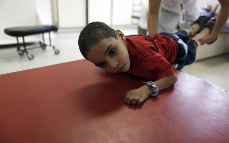 Dhones do Amor Divino undergoes a session of physical therapy in the AACD clinic in Sao Paulo, Brazil on March 23.