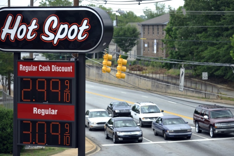A sign for $2.99 a gallon gasoline is seen at a convenience store Spartanburg, S.C., Friday. Oil prices plunged as bleak reports on U.S. job growth and manufacturing heightened worries about a slowing global economy.