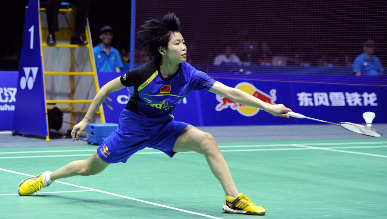 Wang Xin of China returns a shot during the final match at the Uber Cup world badminton team championships on May 26, in shorts.