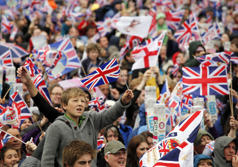 The crowd wait to see the Queen after the Carriage Procession from Westminster Hall to Buckingham Palace in London, Britain, on June 5.