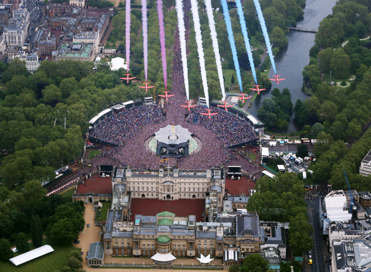The Royal Air Force Aerobatic Team fly in formation over Buckingham Palace as The Royal family stand on the balcony on June 5, in London, England. For only the second time in its history the UK celebrates the Diamond Jubilee of a monarch. Her Majesty Queen Elizabeth II celebrates the 60th anniversary of her ascension to the throne. Thousands of wellwishers from around the world have flocked to London to witness the spectacle of the weekend's celebrations.