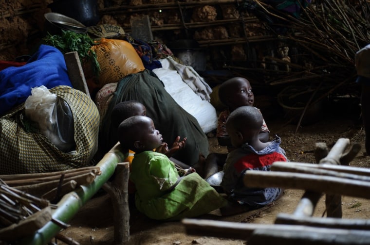 Displaced Congolese children sit in a classroom of the Katoyi primary school, where displaced people shelter in Masisi territory, North Kivu province, on Monday. Over 100 people are using the school to shelter every night as some 1500 families have arrived in Katoyi since an outbreak of attacks in the area which began on May 14.