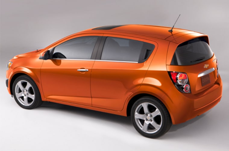 Feisty and fun, the Chevy Sonic hatchback appeals to the boy racer, especially in Inferno Orange.