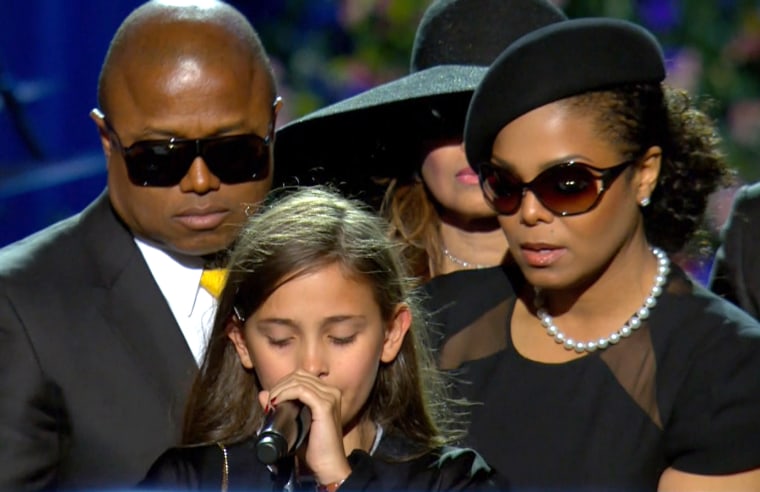 Paris Jackson, then 11, tearfully expressed her love for her father, Michael Jackson, at his memorial service in 2009 as uncle Randy and aunt Janet supported her.