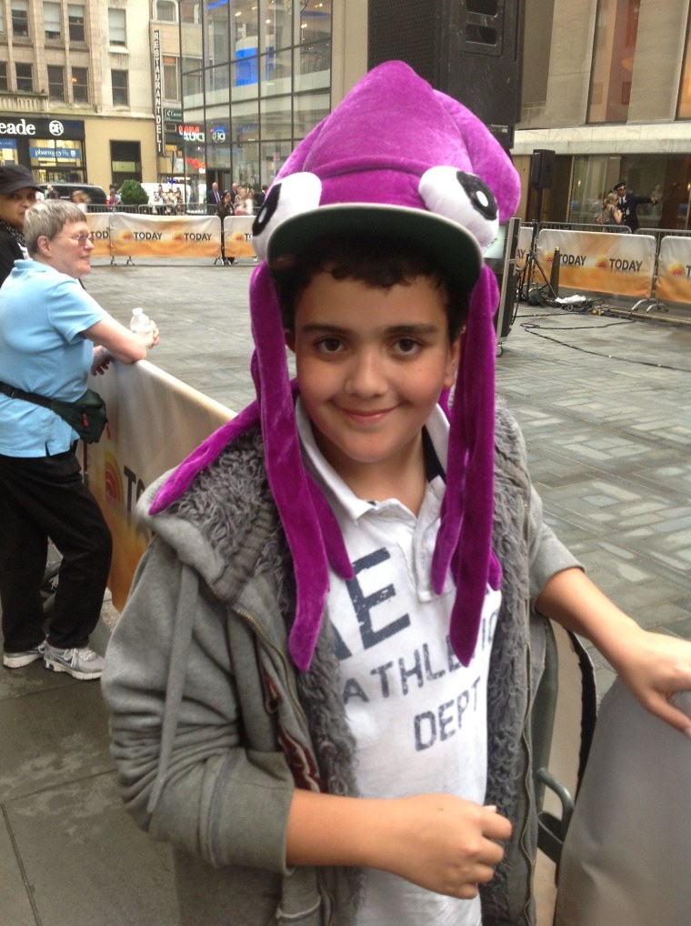 Juancito Monegro from Troy, New York wore his fun hat to the plaza to grab Al's attention. Al makes him smile every morning!
