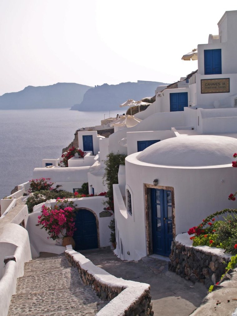Cliffside Houses at sunset in Oia, on the island of Santorini