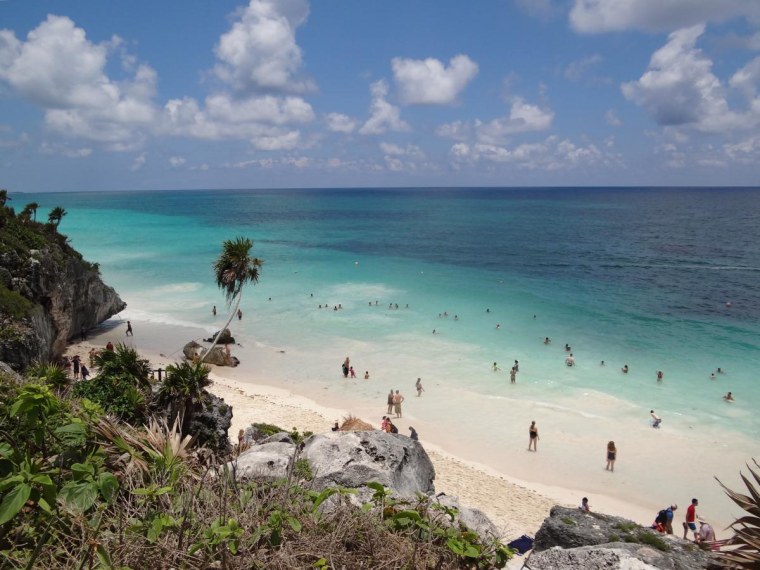 Swimmers at a beach near the Mayan ruins in Cozumel, Mexico.